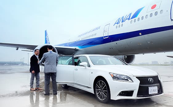 a dedicated car and a staff await a passenger